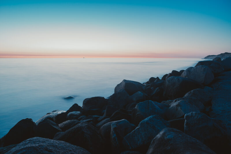 Nightly seascape with water and stones