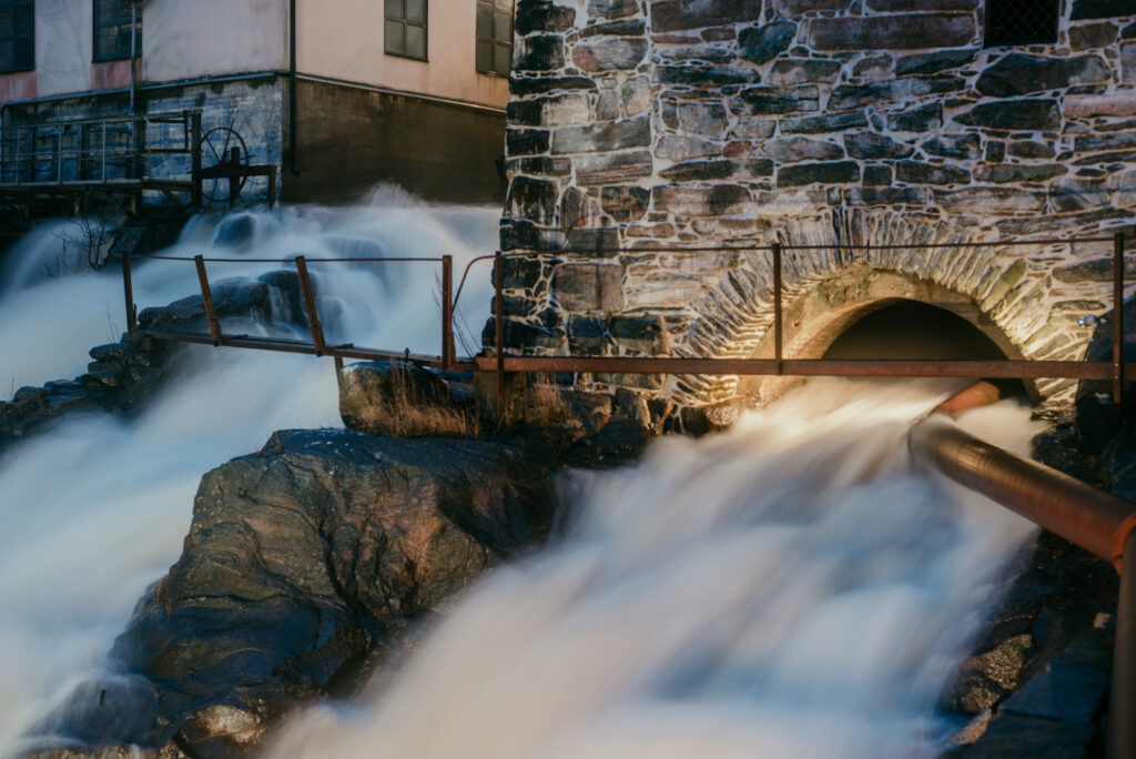 Water flowing between historical buildings