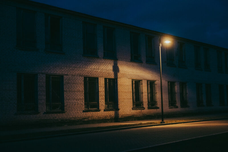 Street light outside an abandoned building